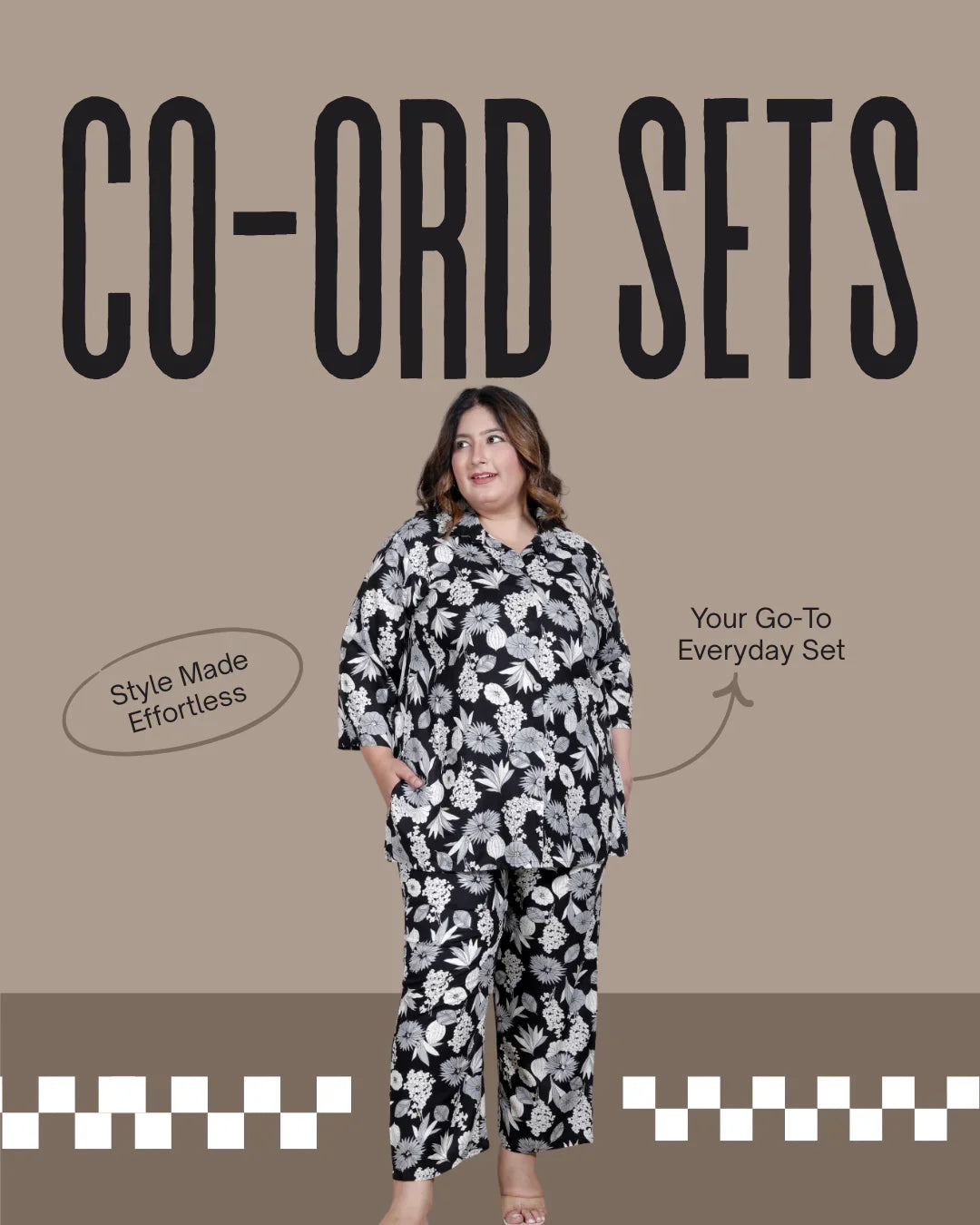 Plus size woman in black and white floral co-ord set with text style made effortless and your go-to everyday set