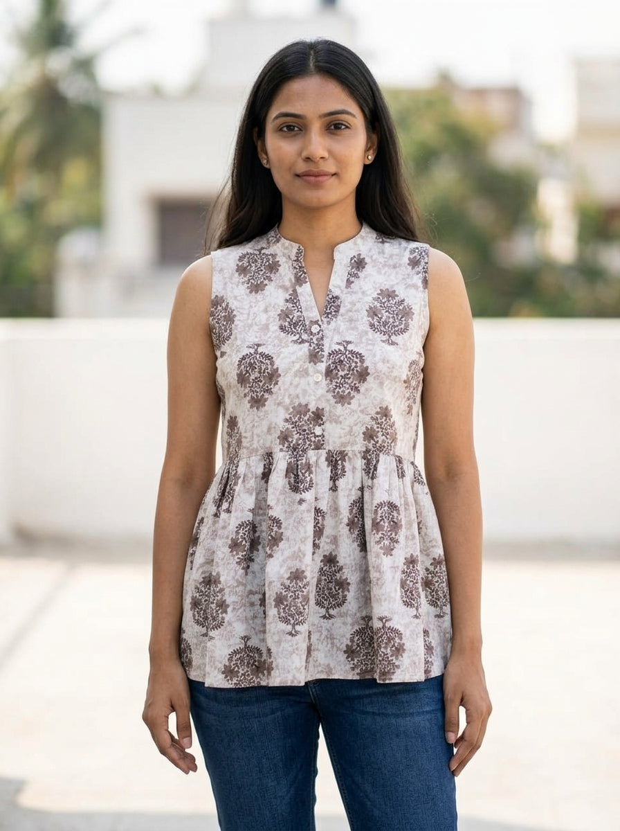 Beige Floral Cotton Sleeveless Peplum Top Main image