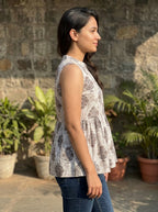 Beige Floral Cotton Sleeveless Peplum Top