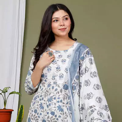 A women in blue and white kurta dupatta set